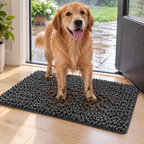 Muddy-pawed dog on the Pawsorb mat with a clean floor beyond