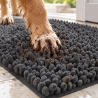 Muddy paw pressing into the thick chenille tufts